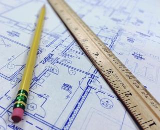 Pencil and ruler on a blueprint