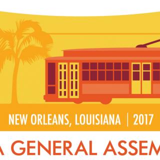 A red trolly against a yellow background, GA 2017 New Orleans